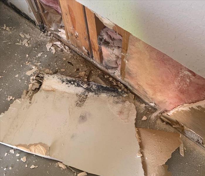 Removing drywall to get to the source of water damage