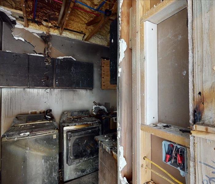 fire damaged laundry room